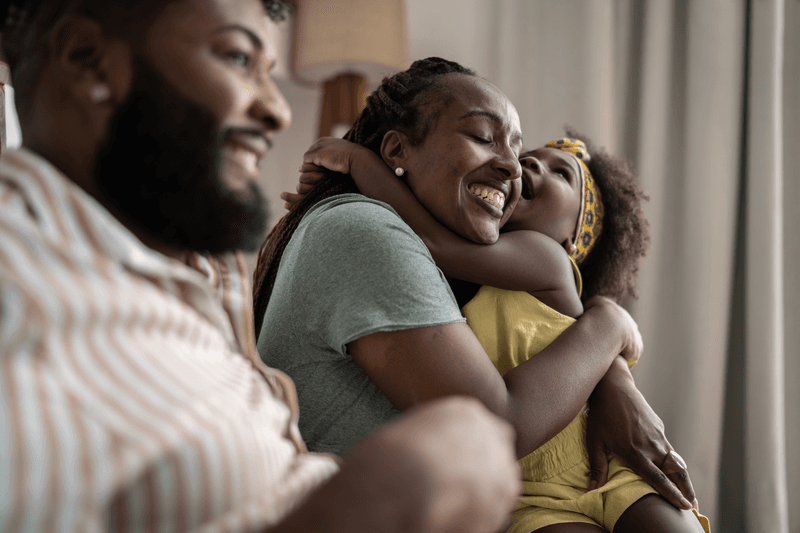 Cute girl embracing mother at home - stock photo
Cute girl embracing mother at home